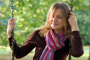 young woman on a swing